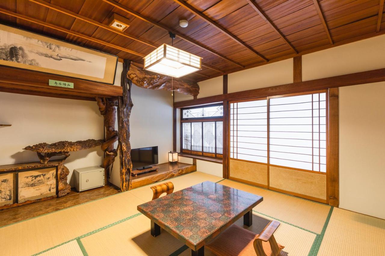 Отель Tsuta Onsen Ryokan Товада Экстерьер фото